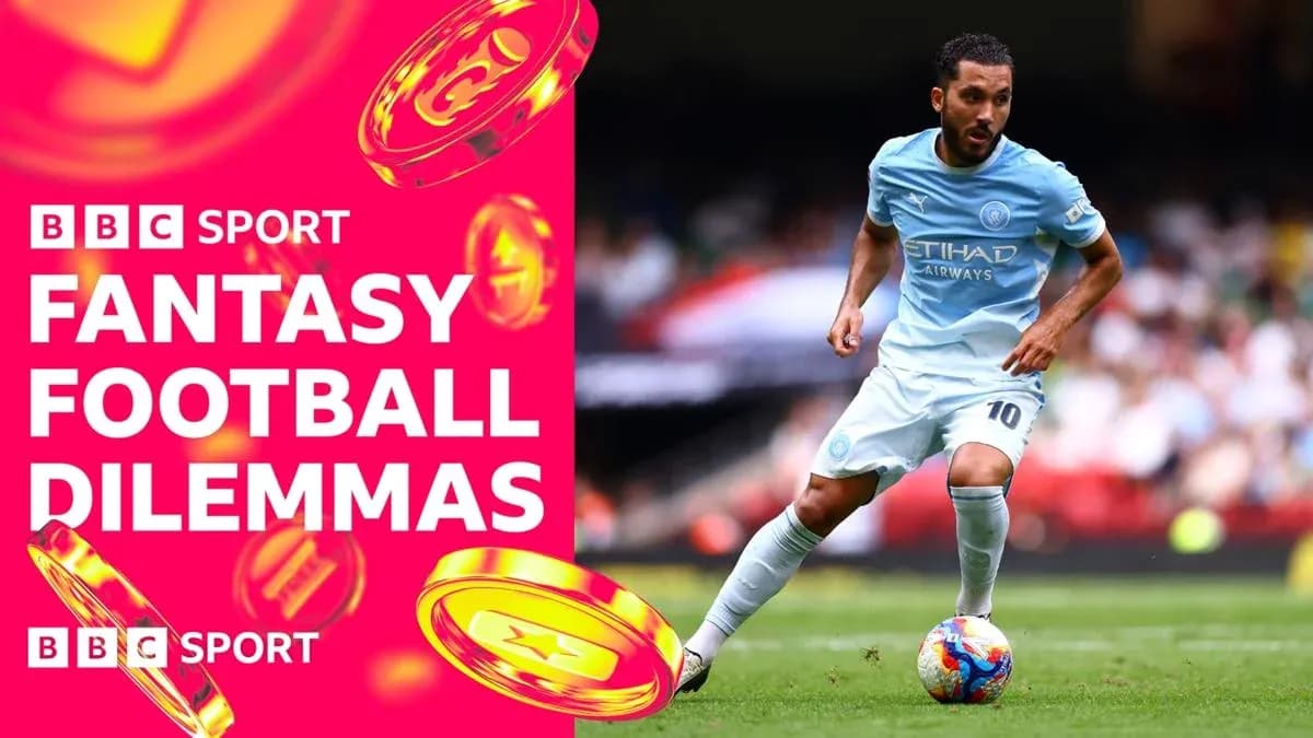 Player in light blue kit dribbling on the pitch