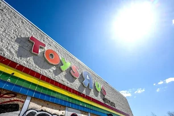 Exterior of a Toys R Us store with colorful signage