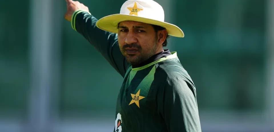 Cricketer gesturing during training session outdoors