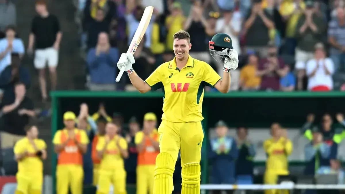 Cricketer celebrating after scoring a century