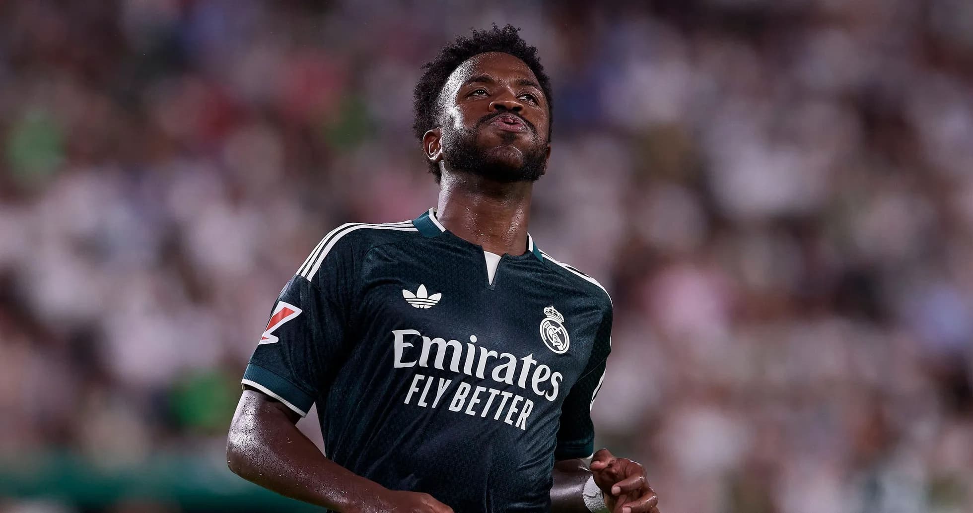 Player wearing Real Madrid jersey on the field