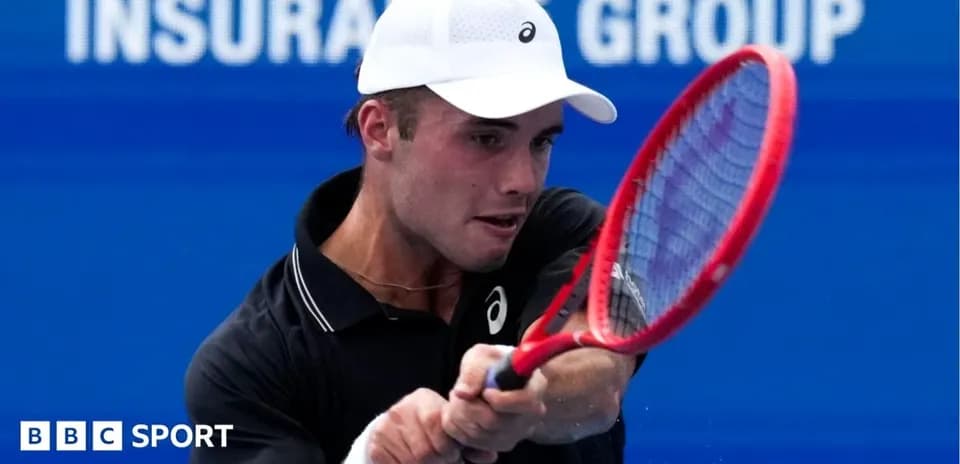 Tennis player preparing to hit a forehand shot