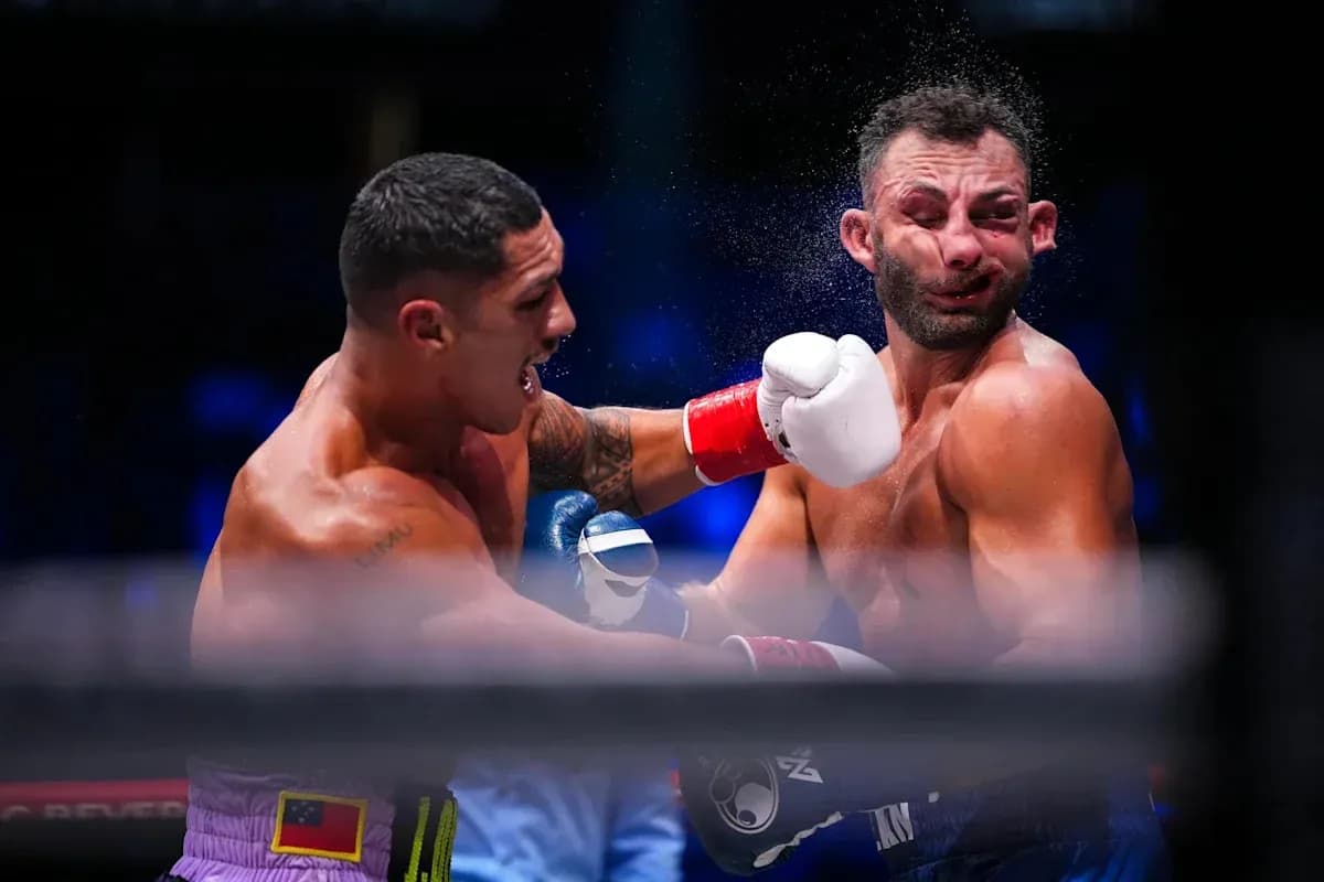 Boxers exchanging punches during a boxing match