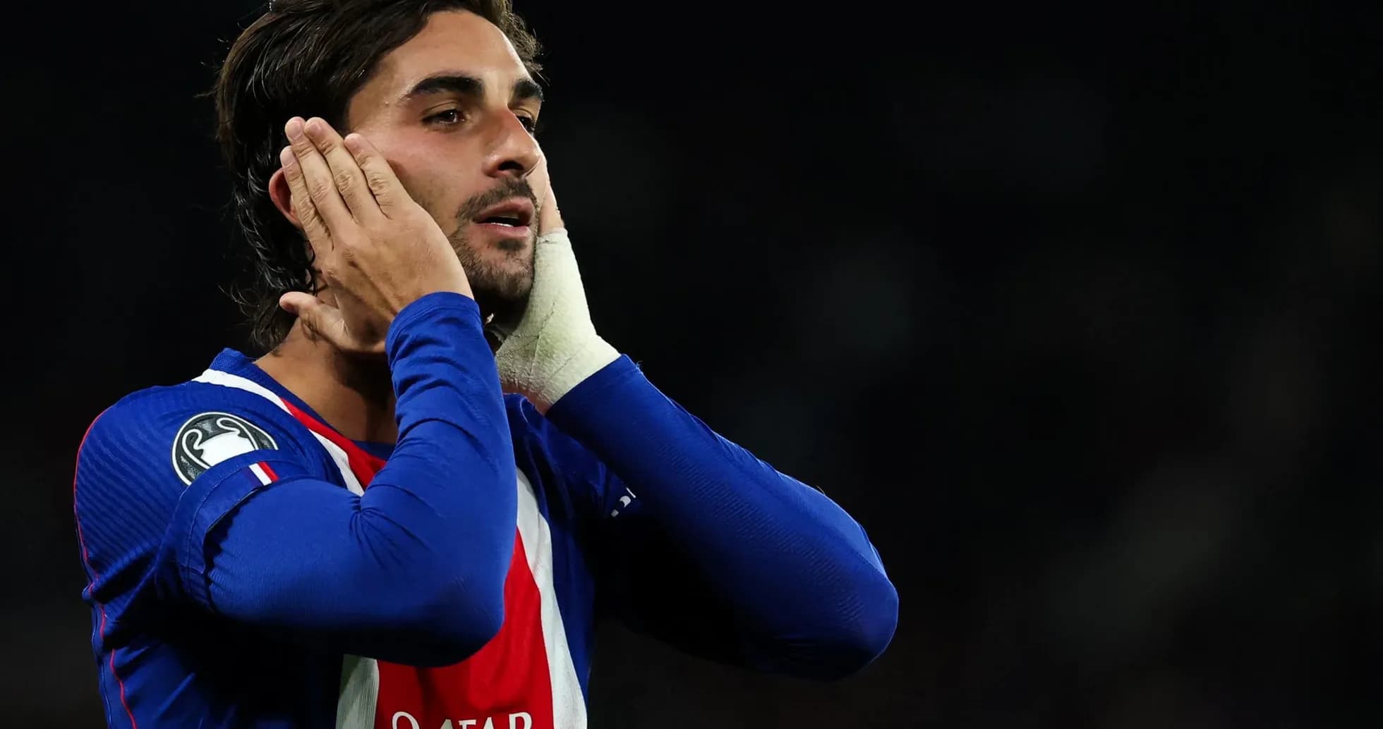 Player holding his face during a match