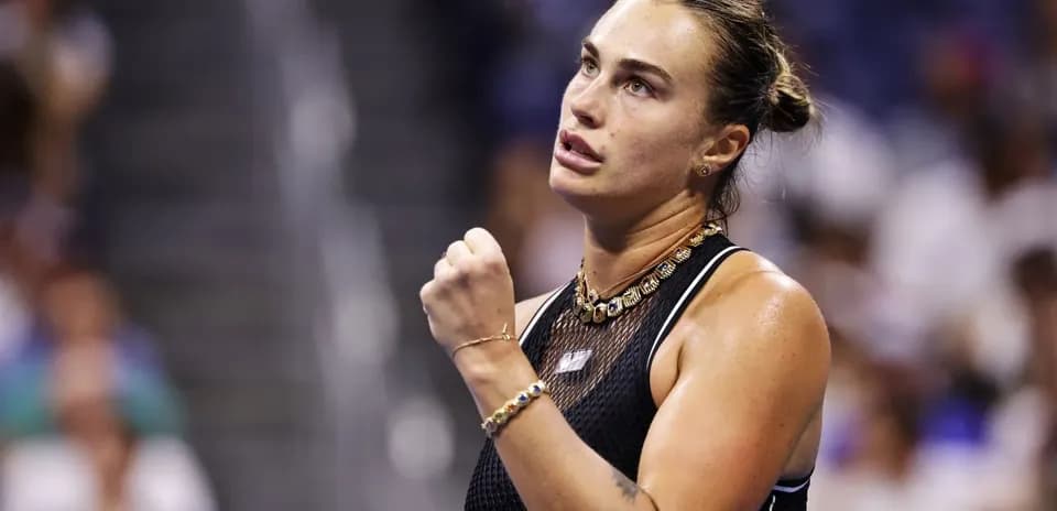 Tennis player celebrating during match at stadium