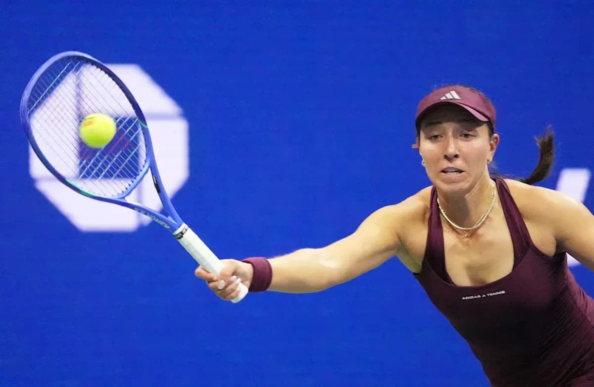 Player reaching for a tennis ball during match
