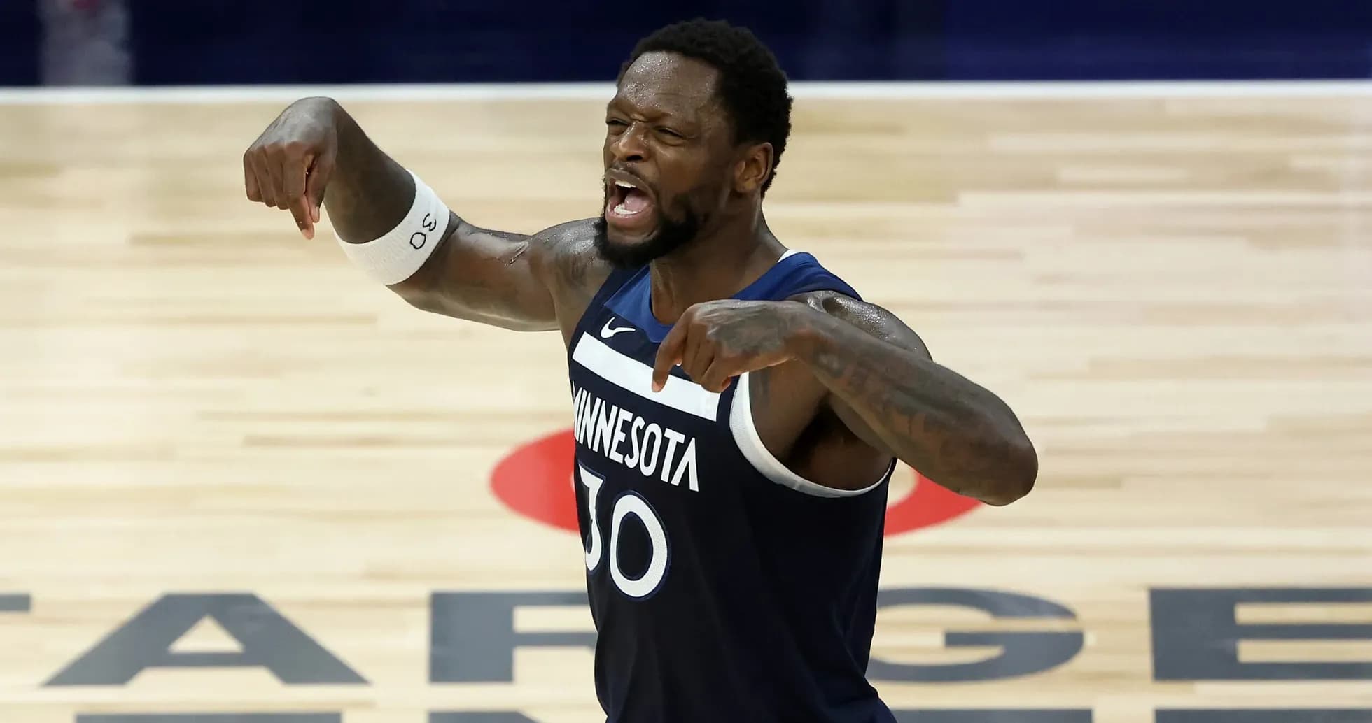 Player celebrating after scoring during basketball game