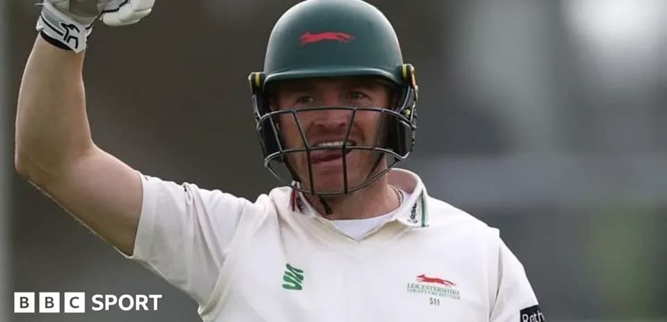 Cricketer celebrating a milestone during match