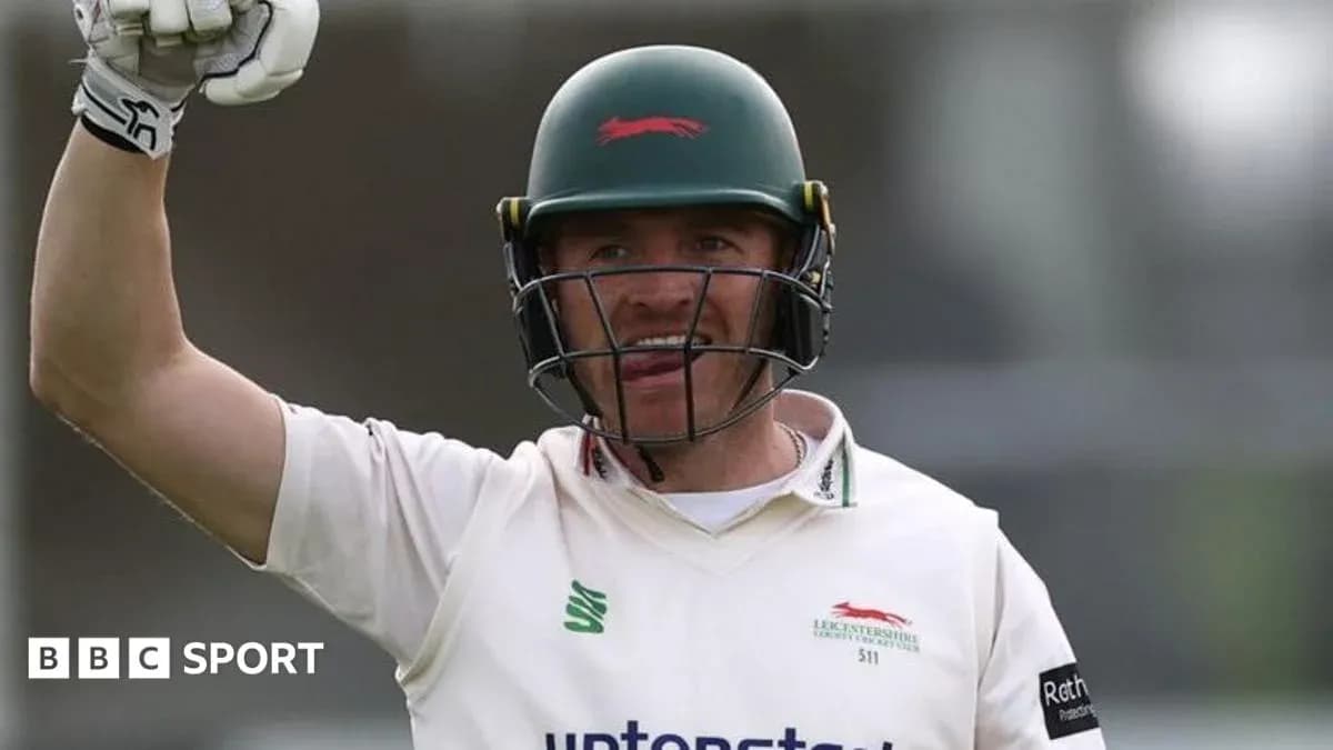 Cricketer celebrating a milestone during match
