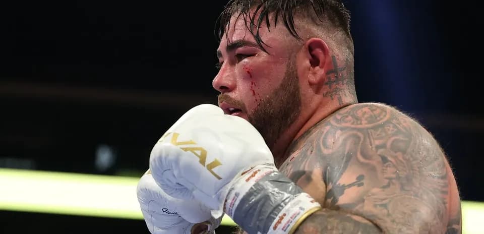 Boxer with gloves preparing for action in ring