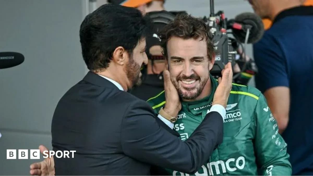 Fernando Alonso smiling during post-race celebration