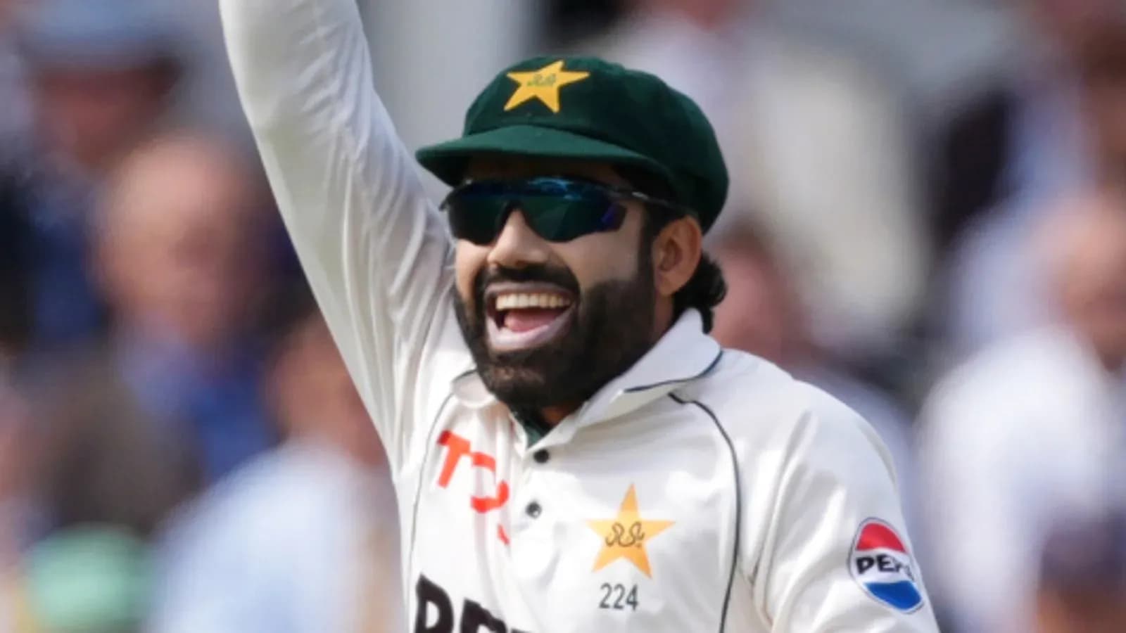 Cricketer celebrating a wicket during match
