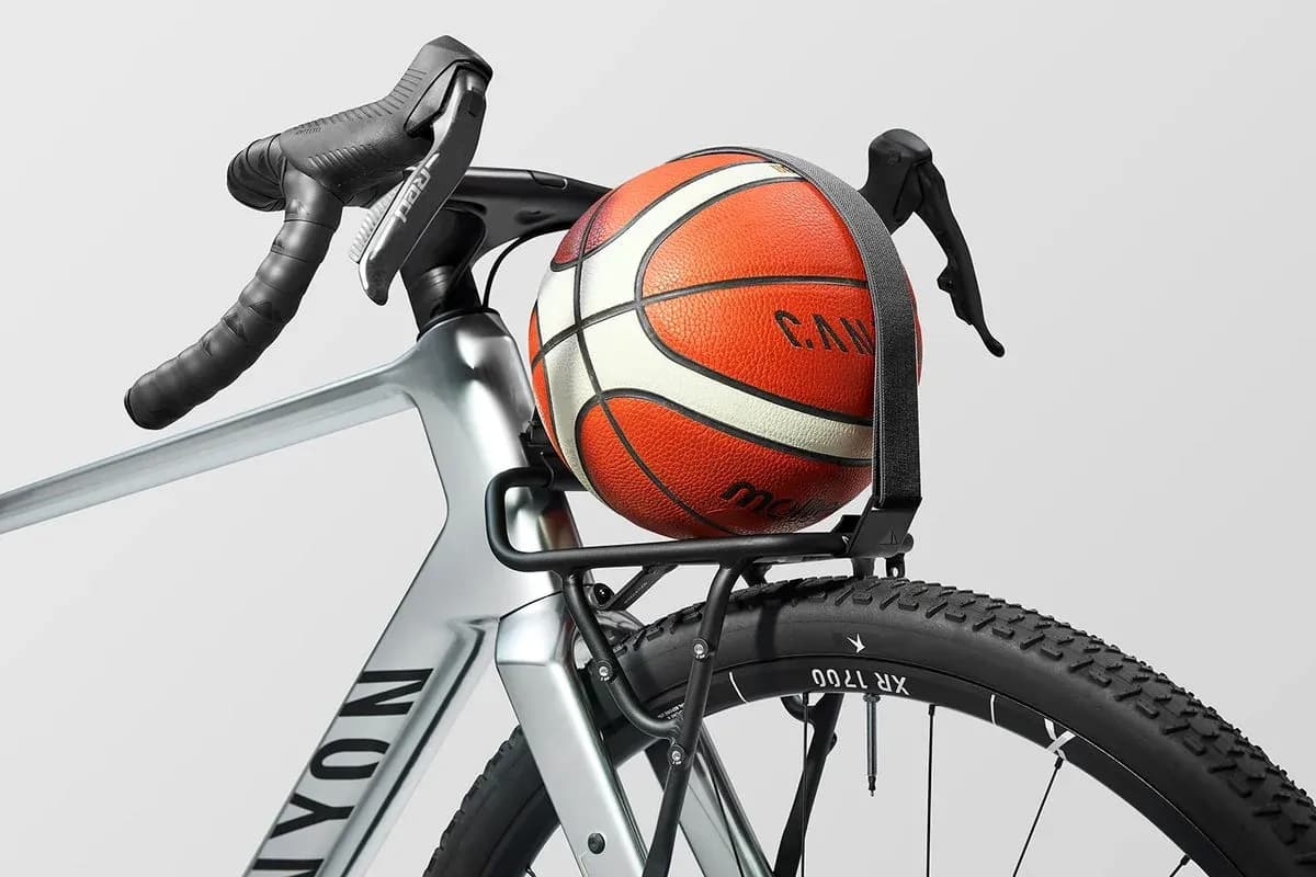 Basketball resting on bicycle frame rack