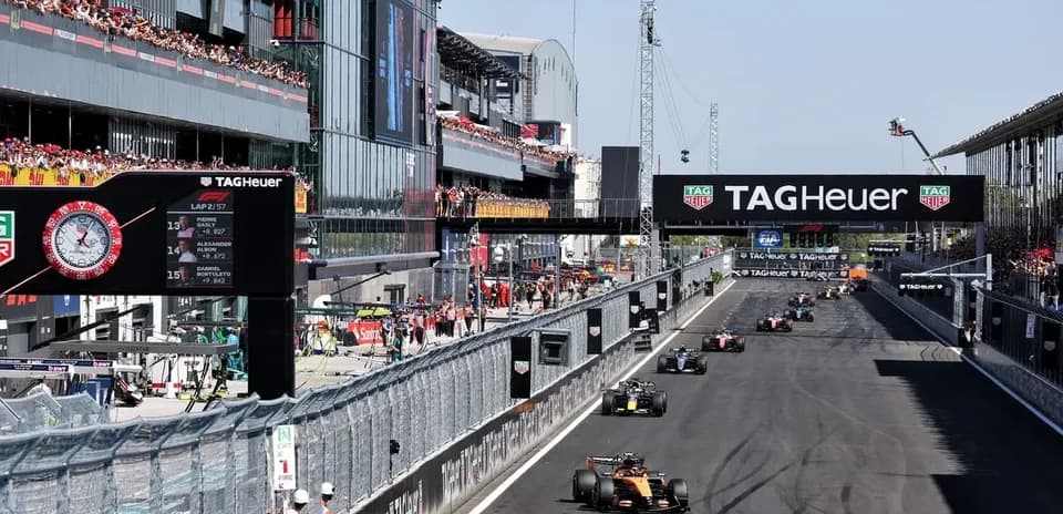 Formula 1 cars racing at the circuit during event