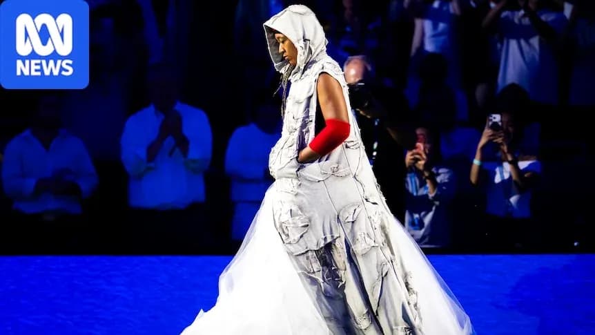 Person in unique outfit walking on stage
