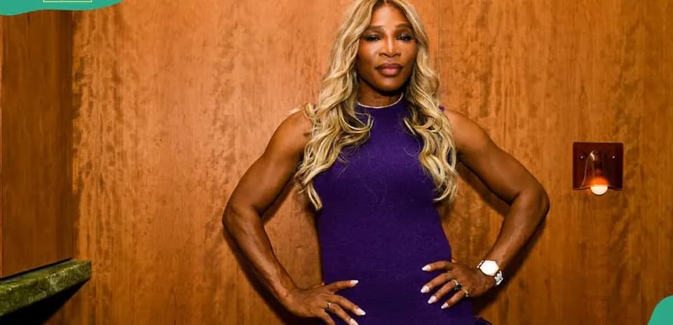 Athlete posing confidently in a purple dress