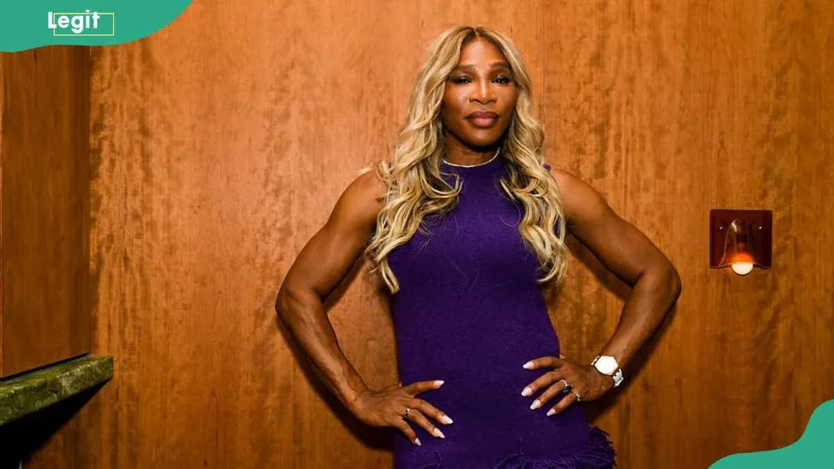 Athlete posing confidently in a purple dress
