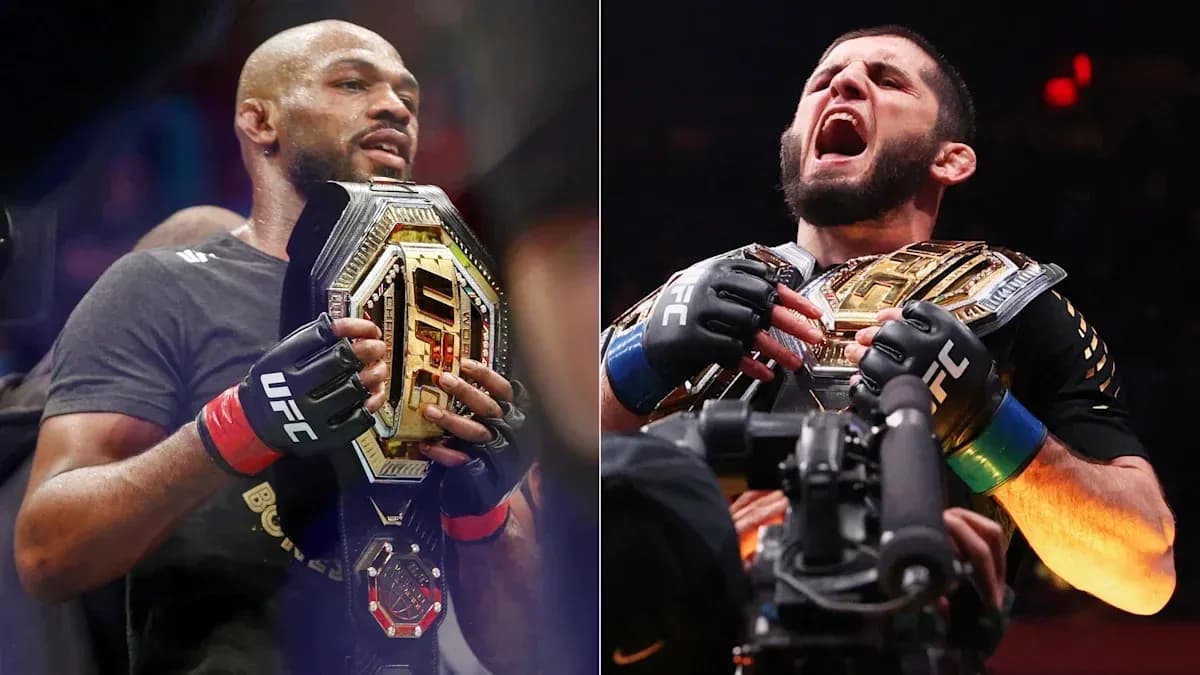 Two UFC champions holding their belts in celebration