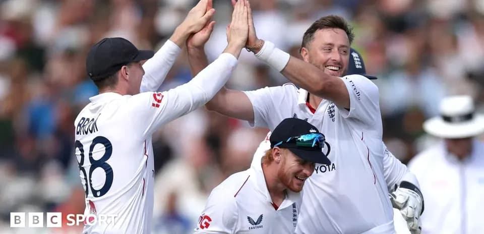England cricket team celebrating a wicket on field