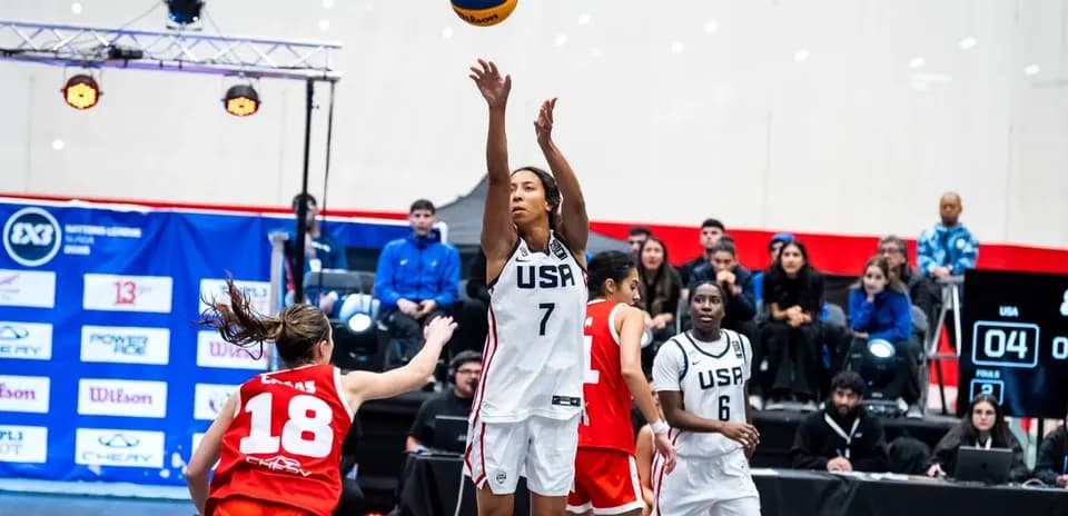 Player shooting a basketball during a game