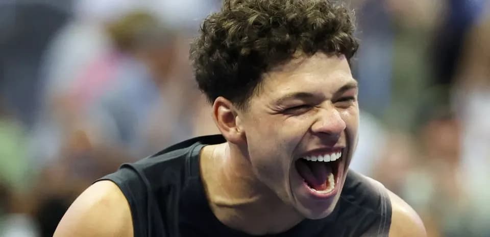 Athlete celebrating enthusiastically during competition