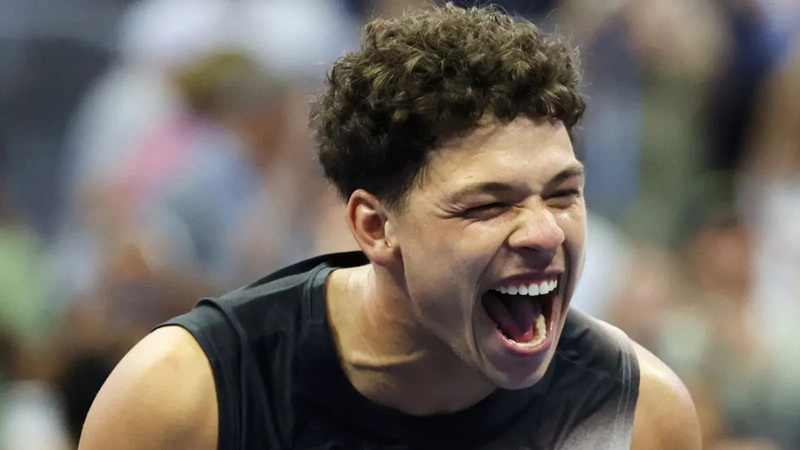Athlete celebrating enthusiastically during competition