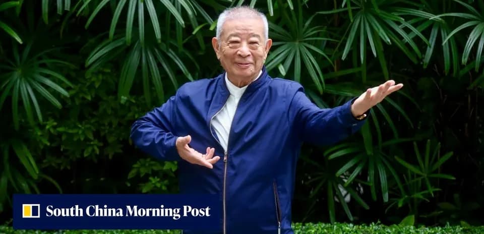 Person demonstrating a tai chi pose in garden