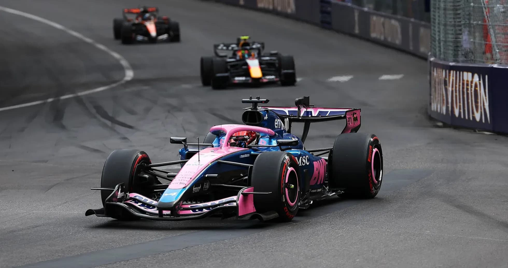 Formula 1 car racing on a street circuit