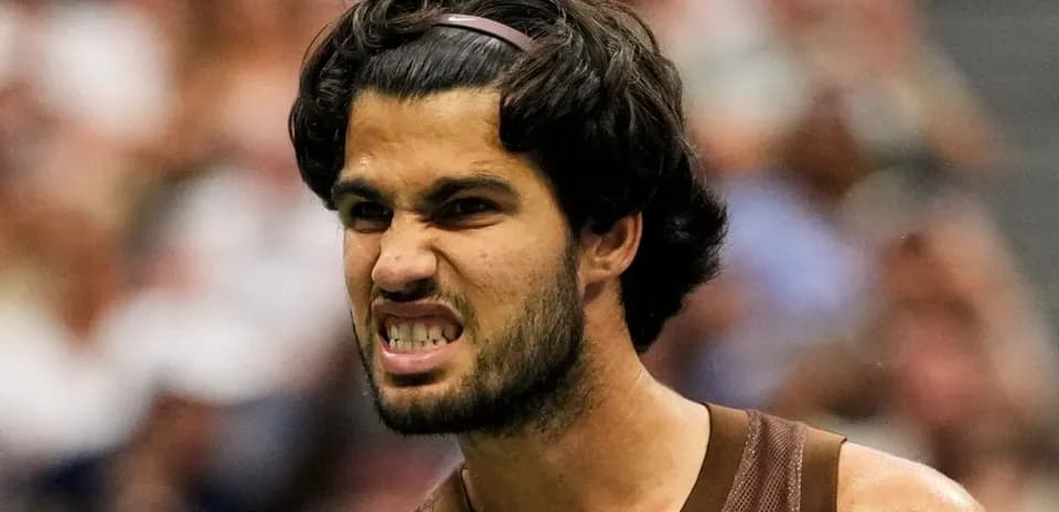 Tennis player celebrating during a match