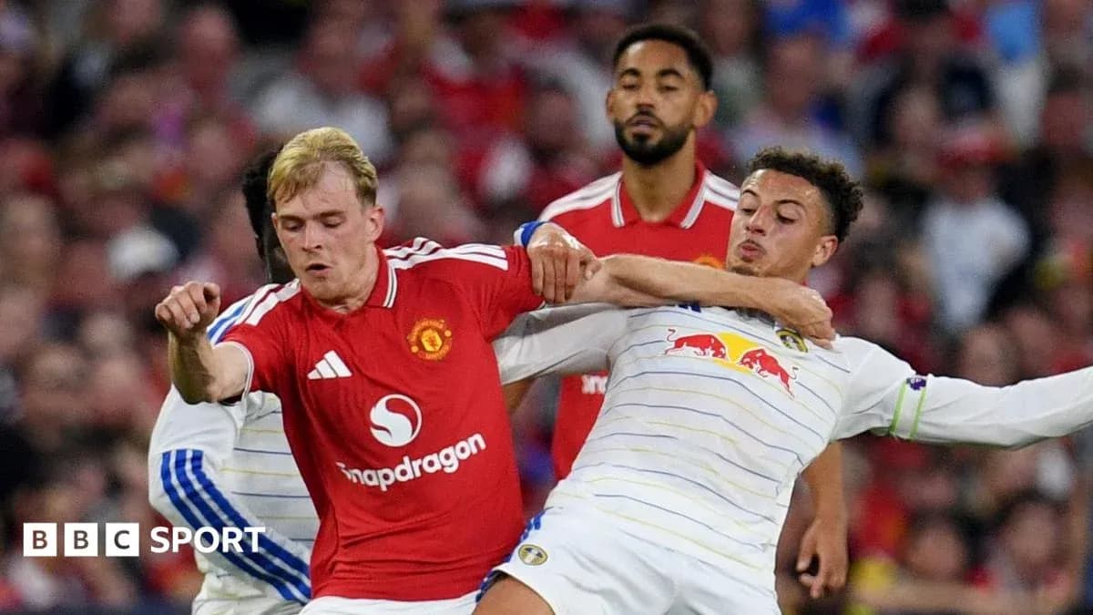 Two players battling for the ball during match
