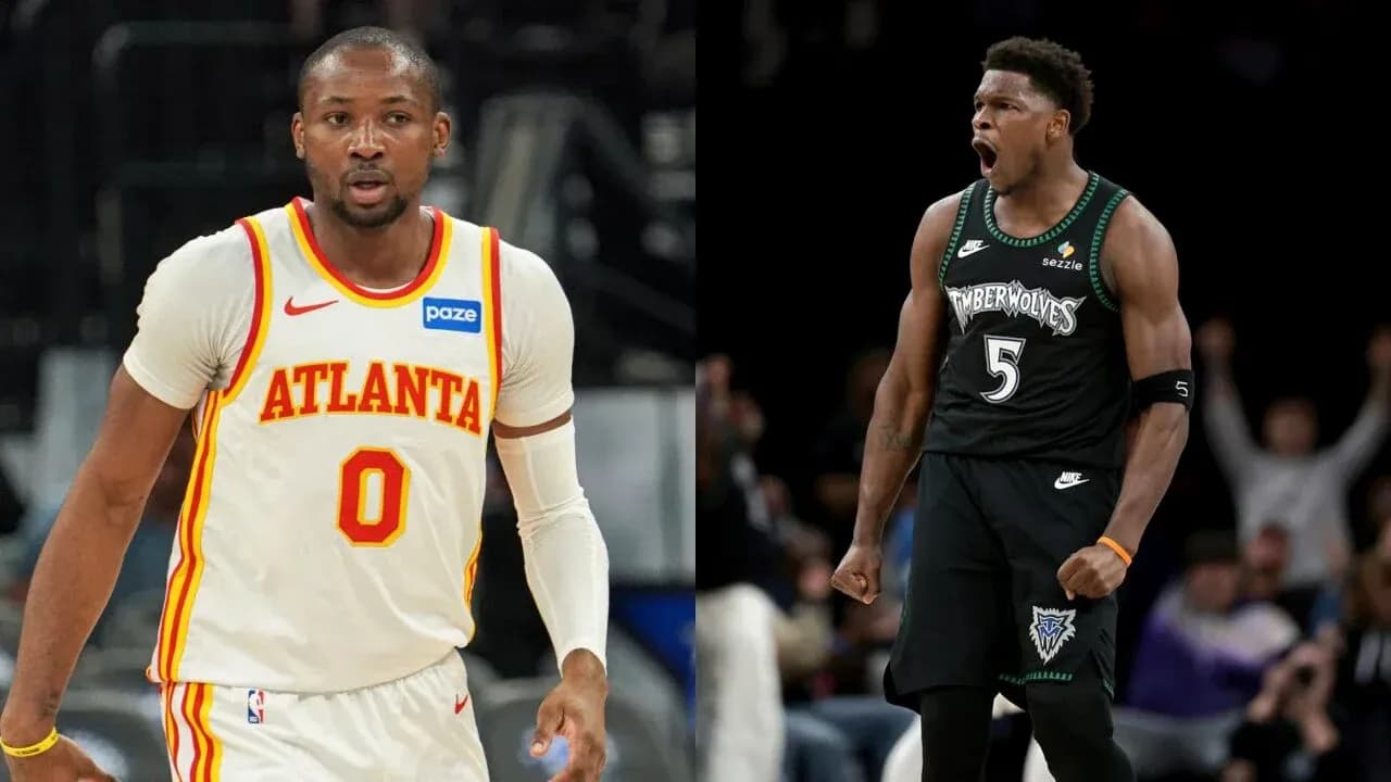Two basketball players in team jerseys celebrating