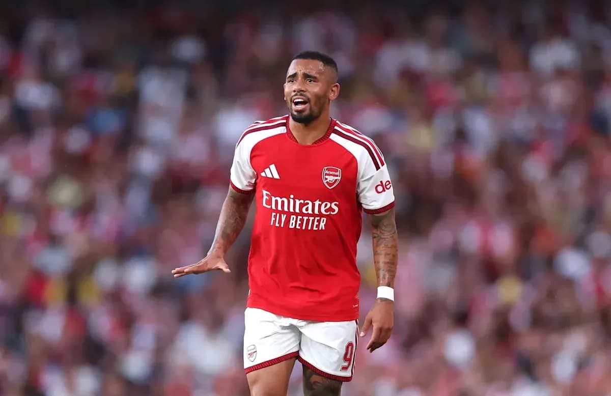 Arsenal player gesturing during a match