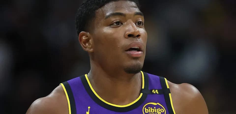 Player wearing Lakers jersey during game action