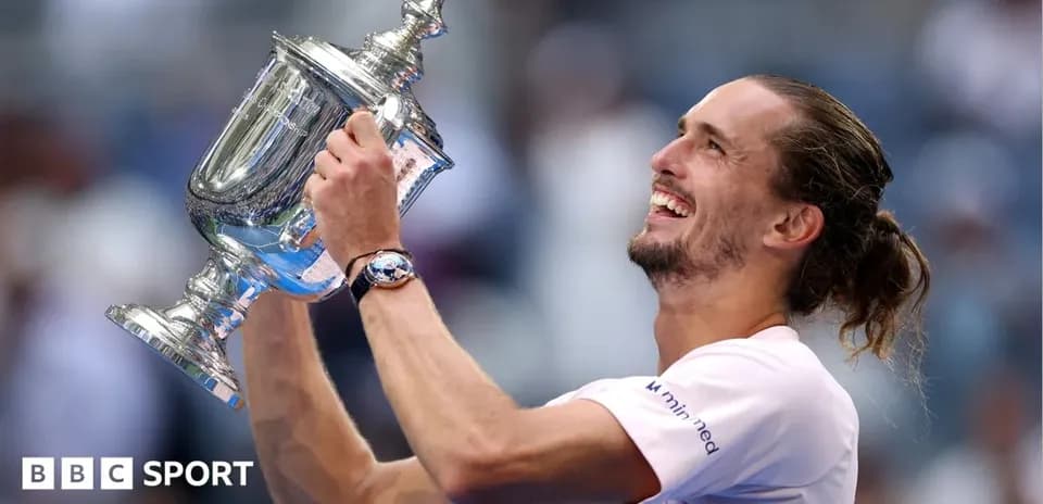 Player celebrating with trophy after tournament victory