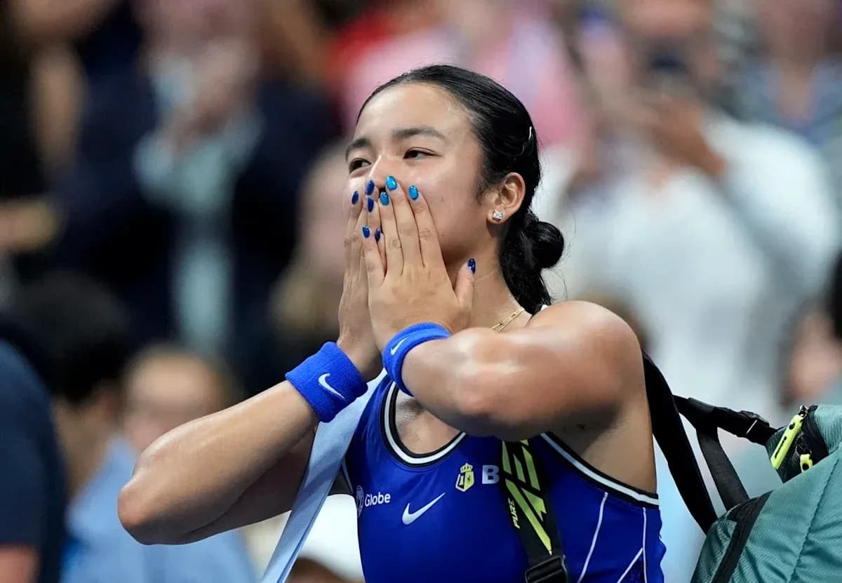 Tennis player celebrating after a match victory