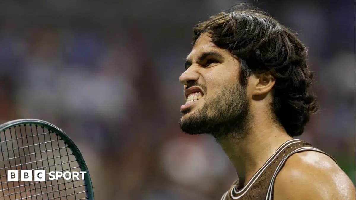 Tennis player celebrating with racquet during match