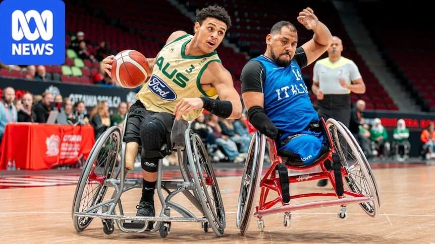 Two wheelchair basketball players competing for the ball