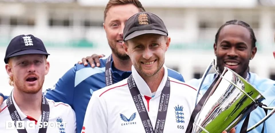 England cricket team celebrating with trophy