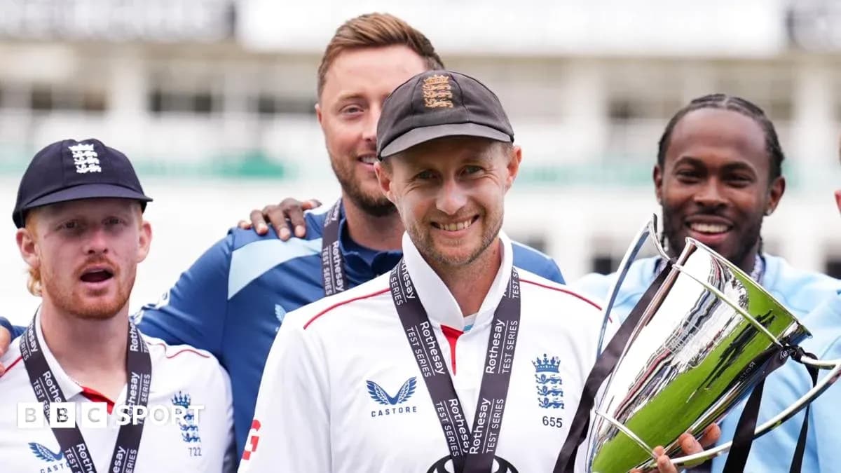 England cricket team celebrating with trophy