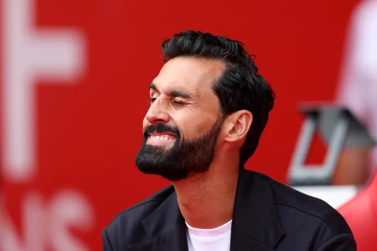 Man smiling while sitting on a bench