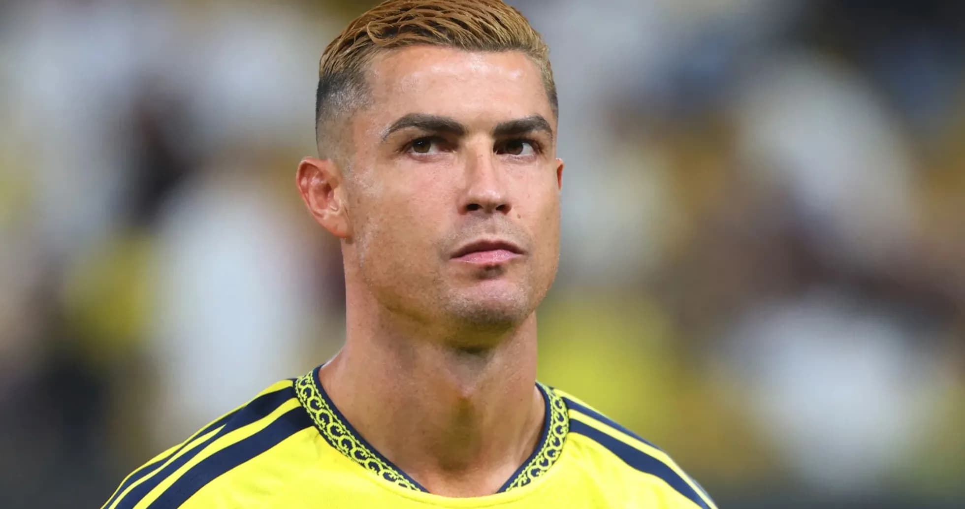 Player in yellow jersey during match warm-up