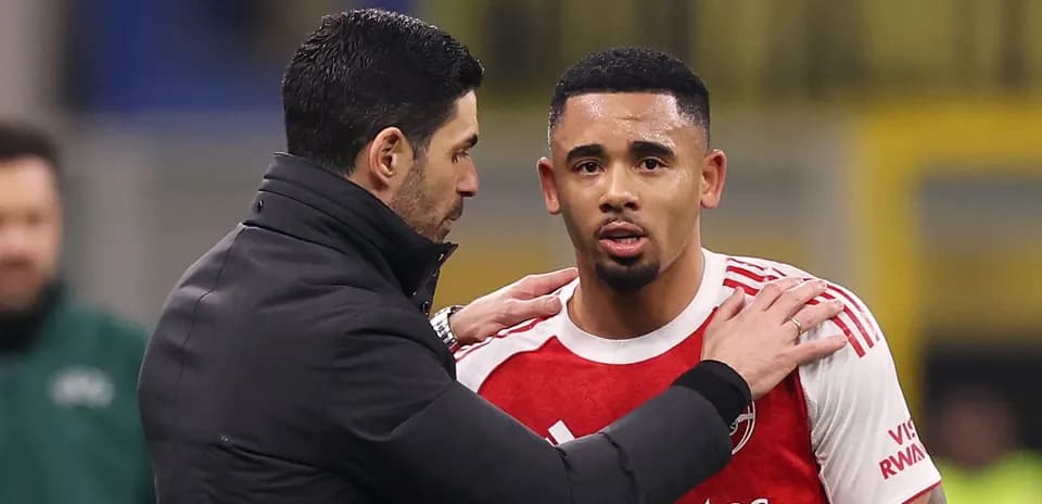 Manager talking to player during match substitution
