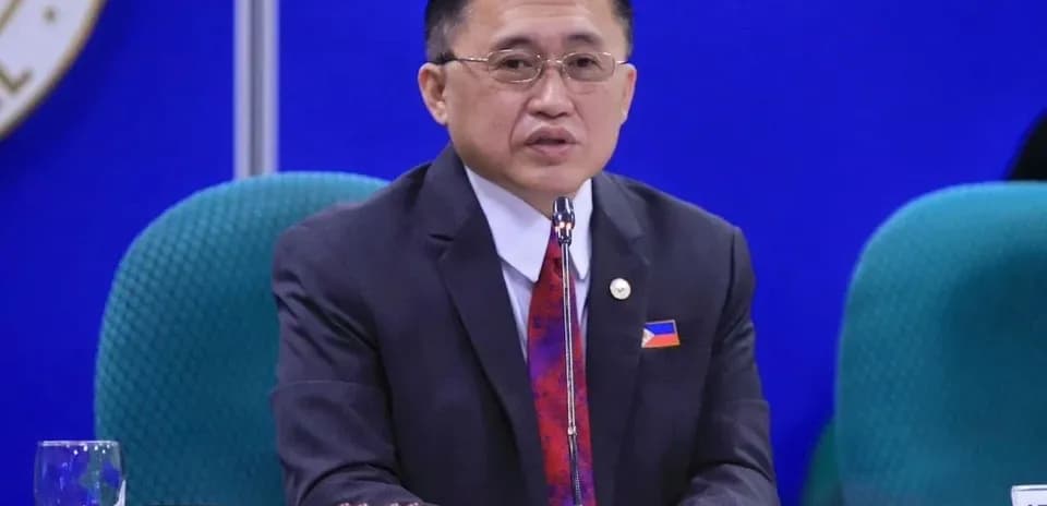Official speaking at a conference with a microphone