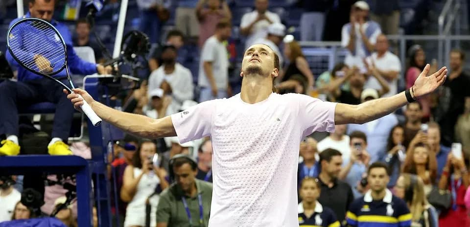 Player celebrating victory at US Open match