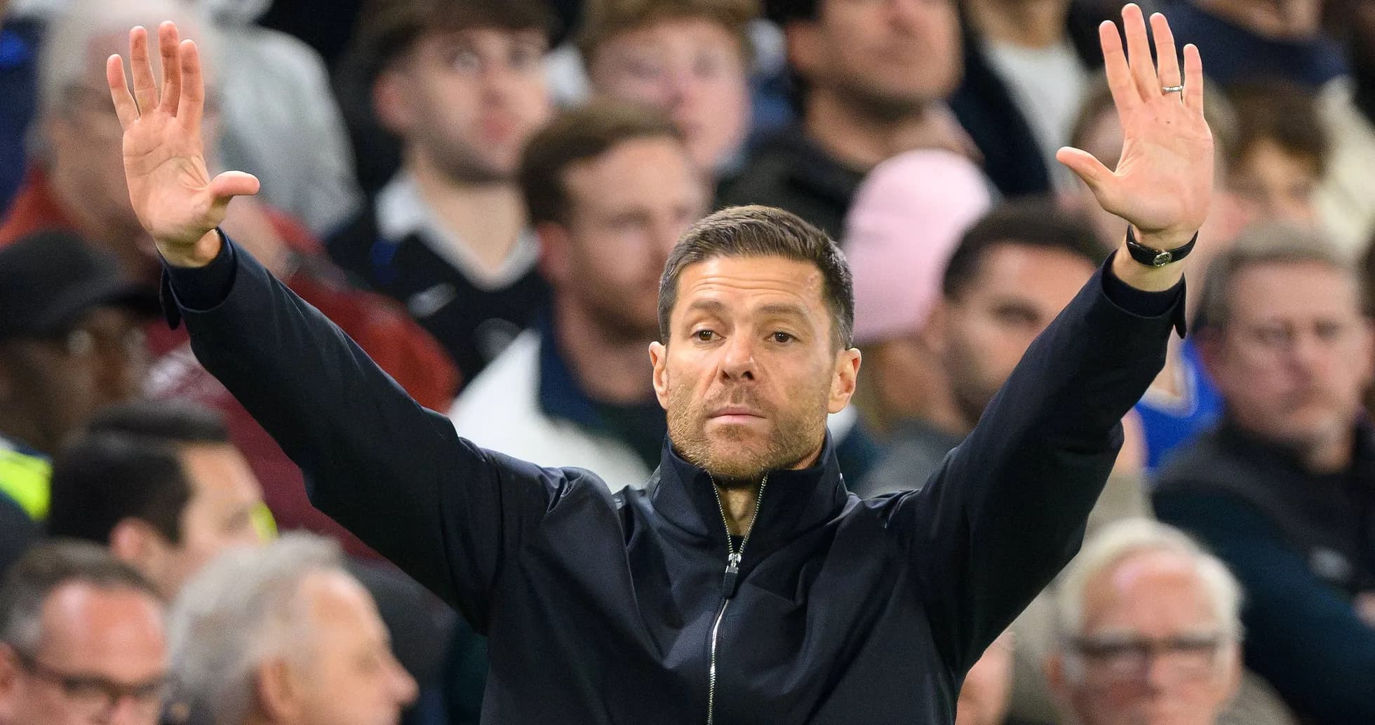 Coach gesturing during a football match
