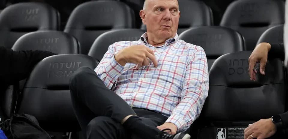 Person sitting courtside at Intuit Dome