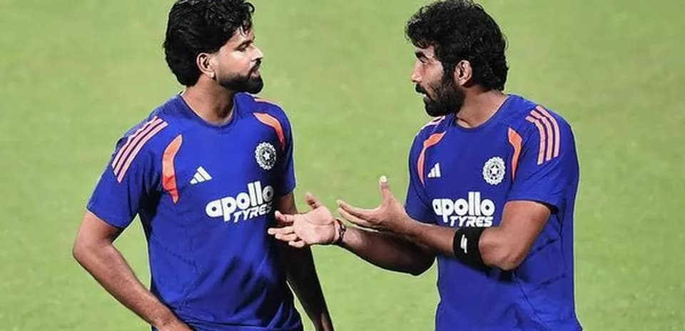 Two players discussing during cricket training session