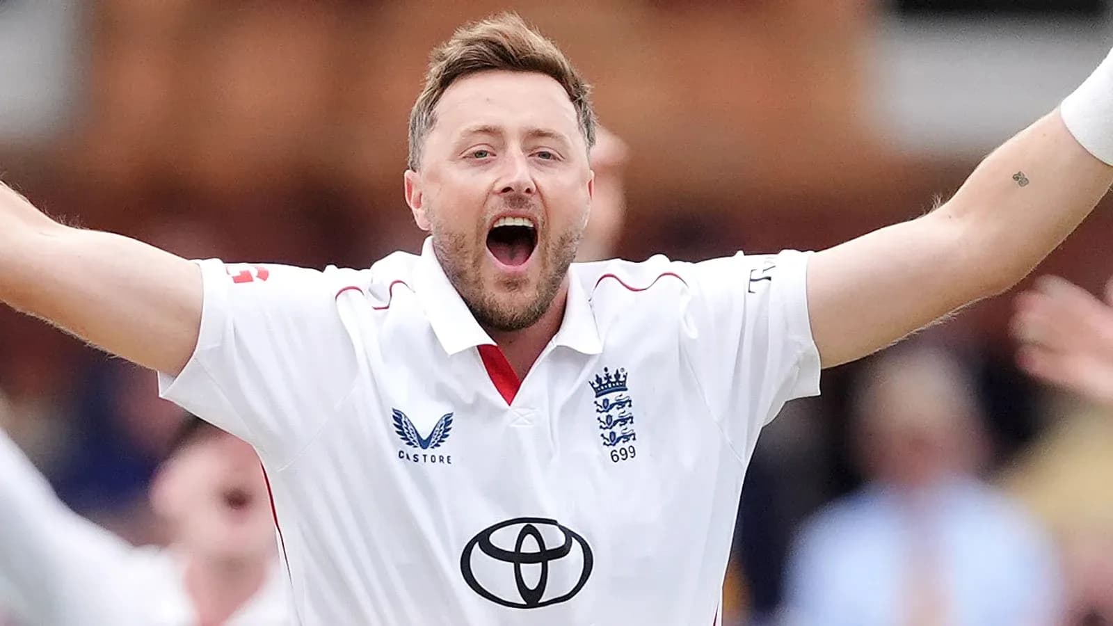 Cricketer celebrating a wicket during a match