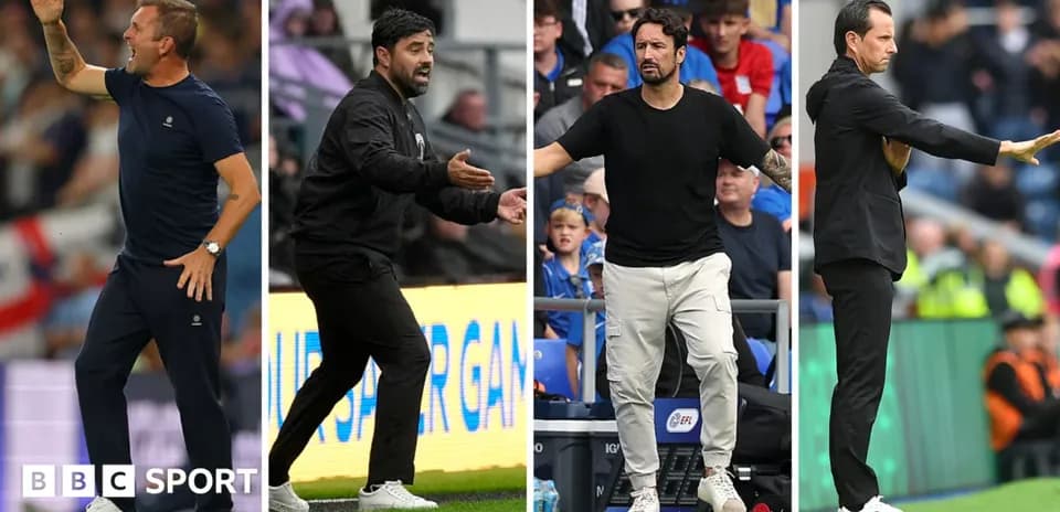Four football managers giving instructions on the sidelines