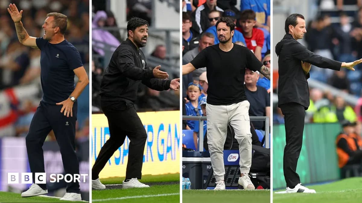 Four football managers giving instructions on the sidelines